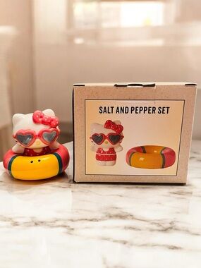 Sanrio Hello Kitty Salt & Pepper Set with Pink Bow and Yellow Float Ring (NWT)